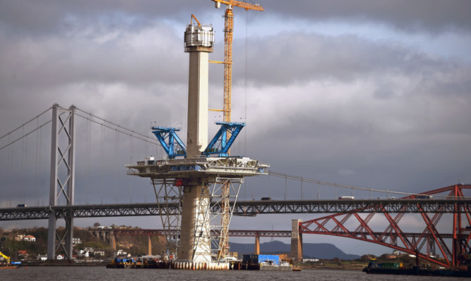 The three towers of the new Queensferry Crossing are now at road deck level and the new bridge will have a 70mph limit.