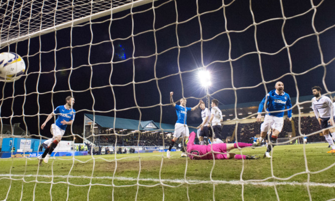 Rangers striker Kris Boyd slots it home to put his side 2-0 up.