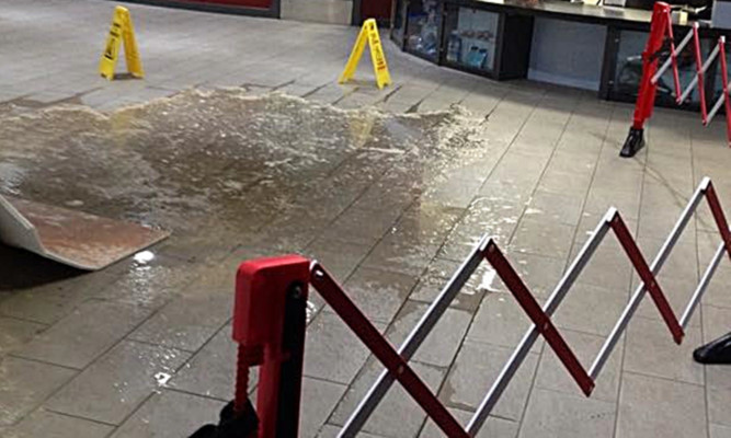 Gallons of water poured into the foyer of the facility.