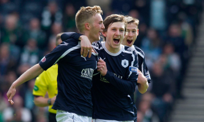 Goalscorer Craig Sibbald, left, is congratulated by Blair Alston.