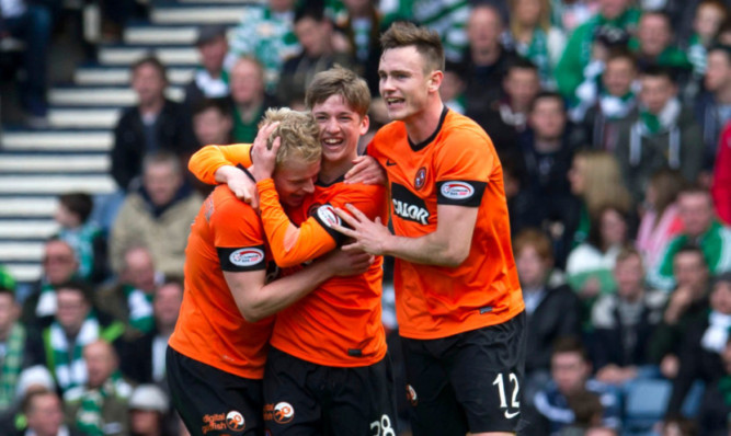Ryan Gauld, centre, and Keith Watson, right, hail ace Gary Mackay-Steven on levelling the score.
