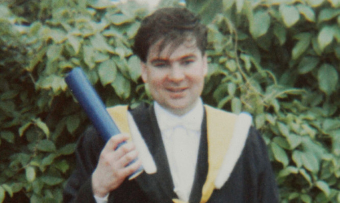 Neil Alexander in his Dundee University graduation robes.