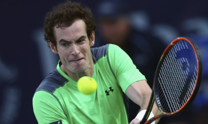 Andy Murray in action against Gilles Muller in the ATP Dubai Duty Free Tennis Championships.
