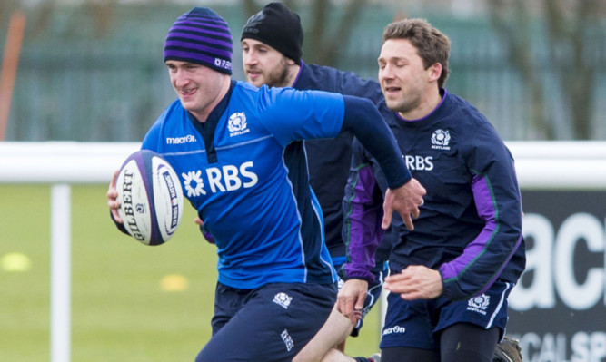 Stuart Hogg shows Chris Cusiter and Tommy Seymour a clean pair of heels in training.