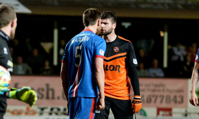 Gary Warren and Nadir Ciftci during Tuesday's game.
