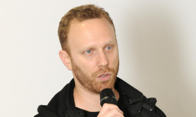 Max Blumenthal during his talk.