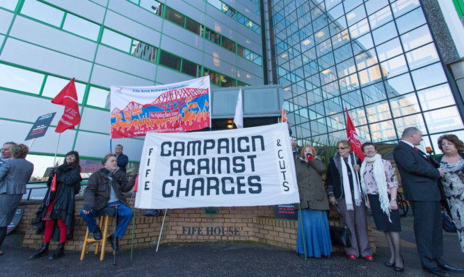 Campaigners outside Fife House in Glenrothes before the budget meeting last month that is still causing political arguments.