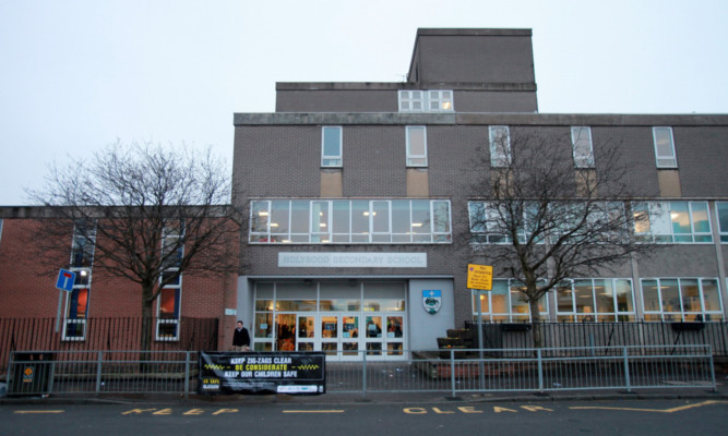Police were called to Holyrood Secondary School in Glasgow.