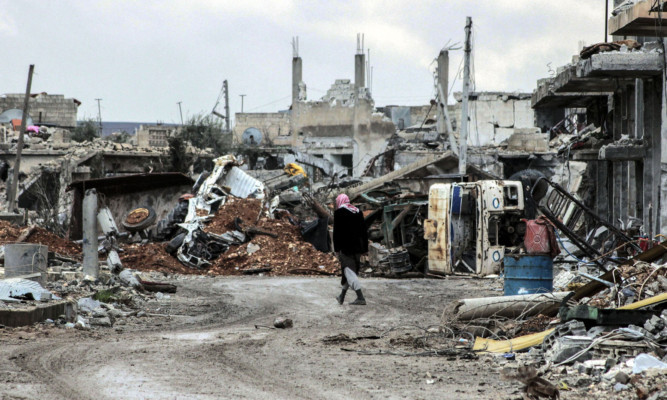 Wreckage left by fighting in the centre of the Syrian town of Kobani after Islamic State fighters were driven out.