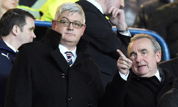 Rangers Chief Executive Derek Llambias (centre) and fellow director  Barry Leach (left) are refusing to quit before Friday's general meeting.