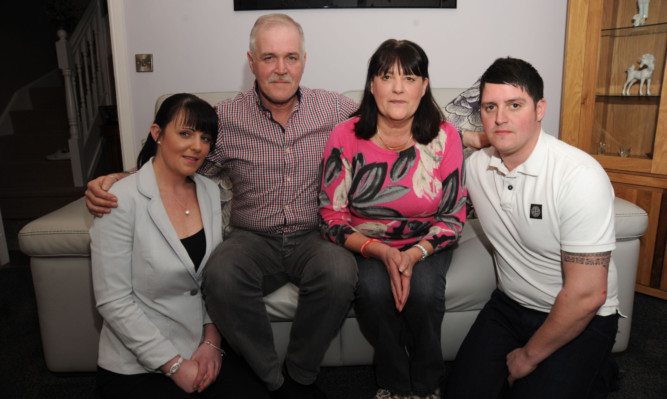 Bidding to change the law: Alan and Tina McLean with daughter Lisa and son Craig at their home in Burntisland.