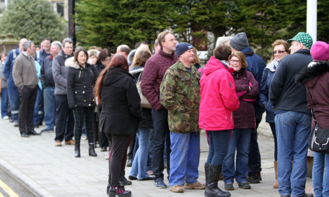 Queues at Montrose Town Hall for Madness tickets.