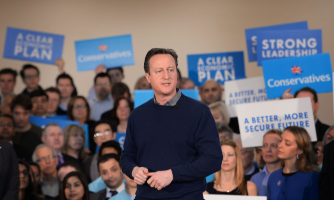 Prime Minister David Cameron addresses supporters and meets party members at a campaign event at the Dhamecha Lohana Centre in London.