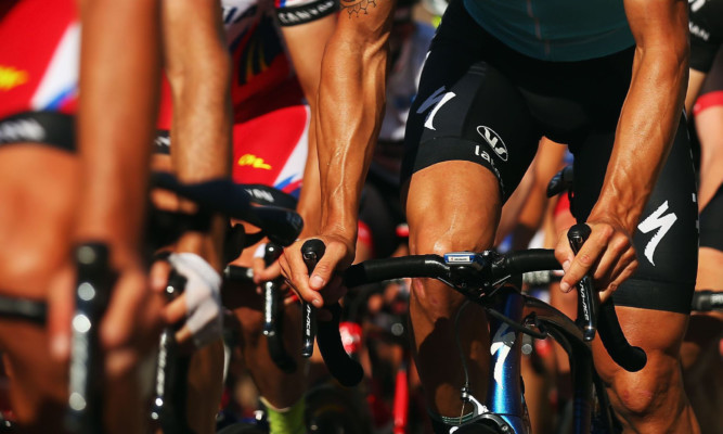 MUSCAT, OMAN - FEBRUARY 20:  Tom Boonen of Belgium and Etixx - Quick-Step rides in the peloton on stage four of the 2015 Tour of Oman, a 189km road stage from Sultan Qaboos Grande Mosque to Jabal Al Akhdhar (Green Mountain) on February 20, 2015 in Muscat, Oman.  (Photo by Bryn Lennon/Getty Images)