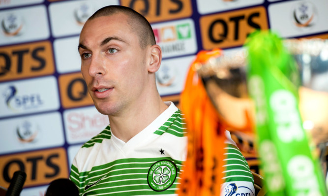 Scott Brown speaks to the press ahead of the Scottish League Cup Final with Dundee United.