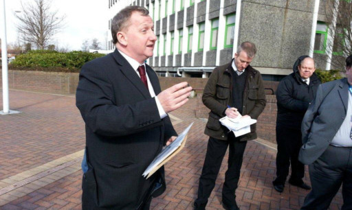 Council leader Alex Rowley addresses Tanshall parents outside Fife House.