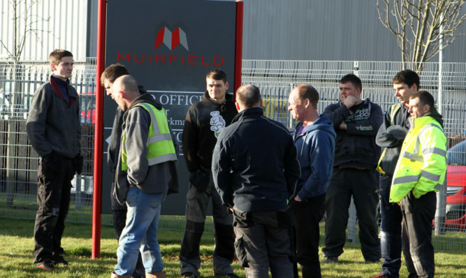 Workers outside the Muirfield premises in Camperdown Industrial Park.