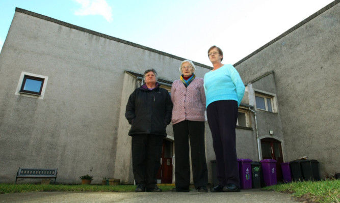 At Priory Court in Forfar are, from left, Wilma Whyte, Margaret Massie and Martha Jamieson. Residents there and in other streets are unhappy about ongoing phone problems.