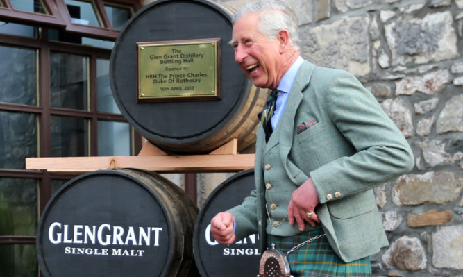 The duke during his visit to the bottling plant.