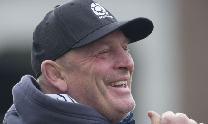 Scotland coach Vern Cotter in a rare happy mood at training this week.