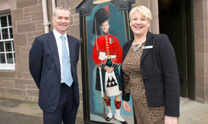 Stagecoach Group chief executive Martin Griffiths with Anne Kinnes, chief executive of The Black Watch Castle and Museum.