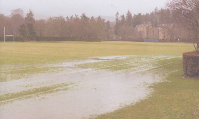 Residents say the planned site for all-weather pitches is regularly flooded with sewage.