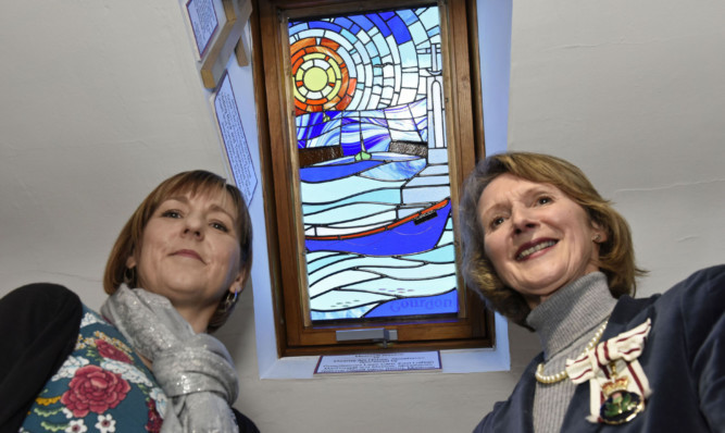 Artist Fiona Paterson and Lord Lieutenant of Kincardineshire Carol Kinghorn beside the window.