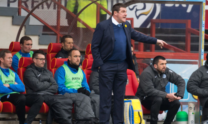 Tommy Wright urging his side on at Firhill.