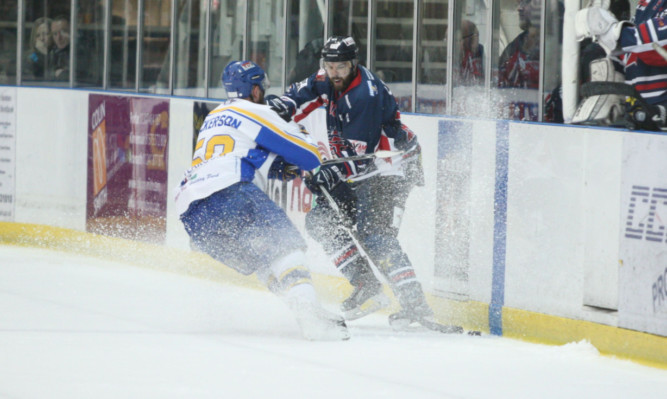 Stars Shane Lust takes on Flyers Matt Nickerson.