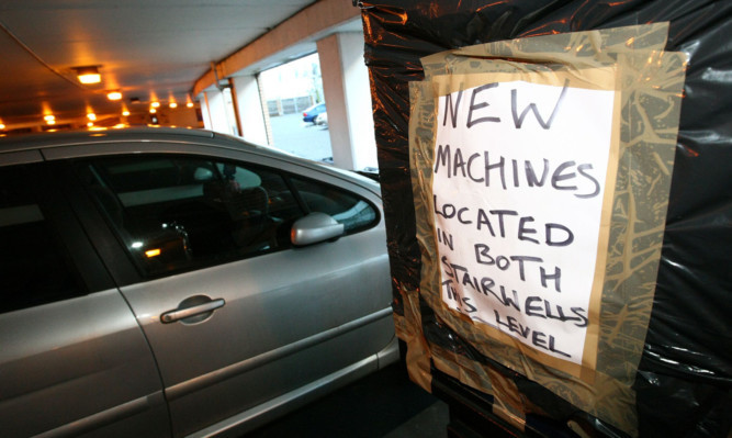 One of the older meters covered up at the Kinnoull Street car park.