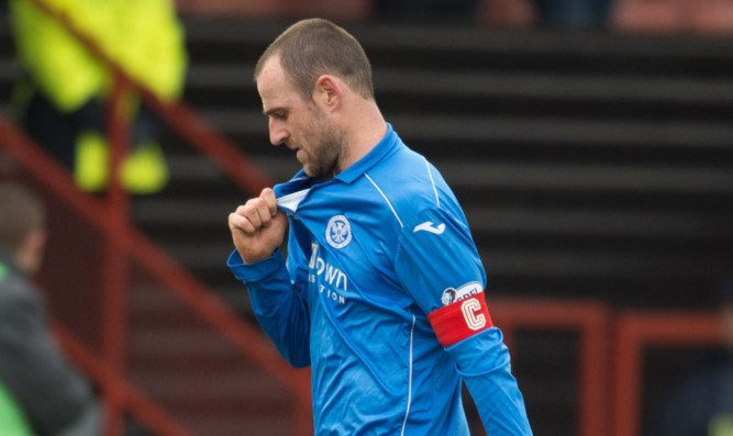 Dejection for St Johnstone captain Dave Mackay at Firhill.