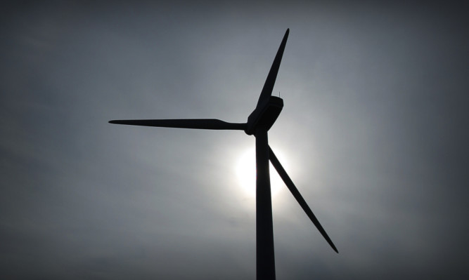 Kris Miller, Courier, 04/03/13. Picture today at Methil shows the wind turbine at Methil docks. Plans to build a turbine, five times the size of this one have been submitted. **Sky left at top of pic as requested.