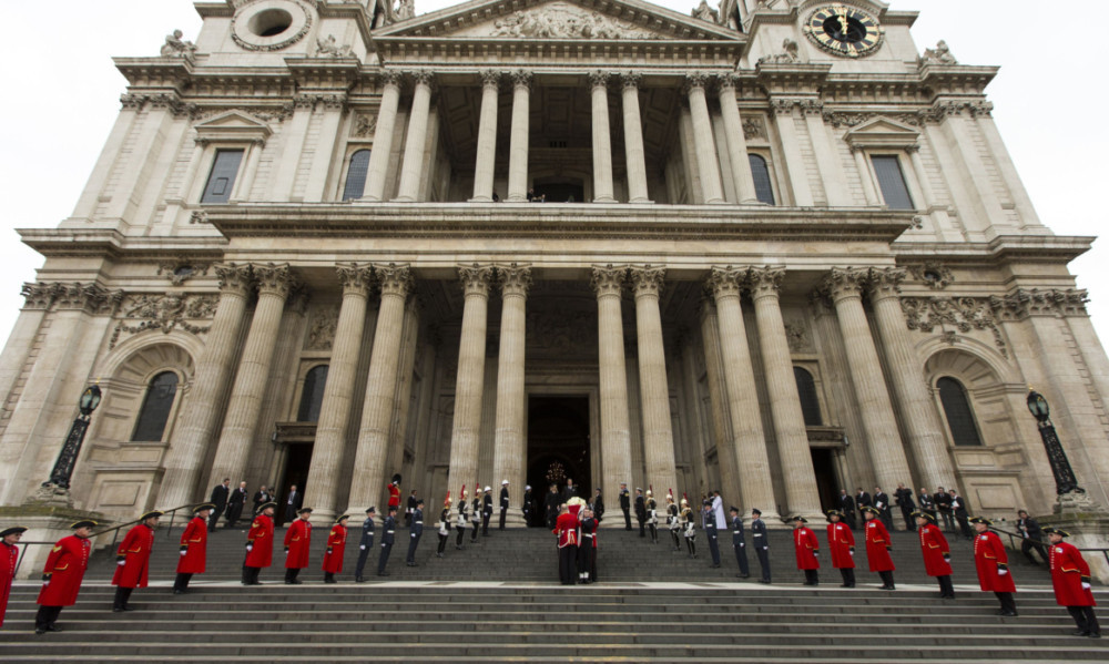 Baroness Thatcher's coffin is carried down the steps of St Paul's Cathedral.