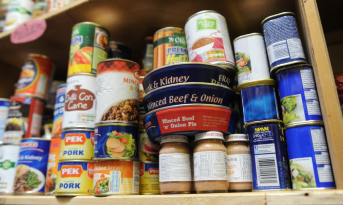 07.10.14 - FOR FILE - pictured in the foodbank in the Old and Abbey Church, West Abbey Street, Arbroath are some of the foodstuffs whcih will be distributed on the shelves