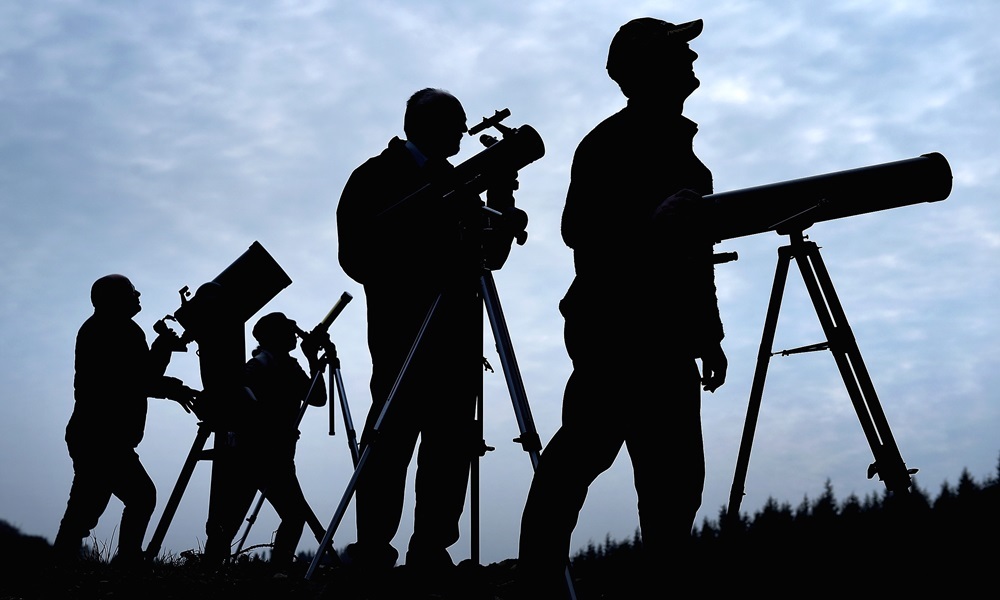 NEWTON STEWART, SCOTLAND - MARCH 19:  Members of the Galloway Forest Astronomical Society prepare their equipment ahead of tomorrows solar eclipse on March 19, 2015 in Newton Stewart, Scotland. Tomorrow the UK will see a partial solar eclipse with up to 98 per cent coverage, which is due to pass over Britain between 07:41 UTC and 11:50 UTC. (Photo by Jeff J Mitchell/Getty Images)