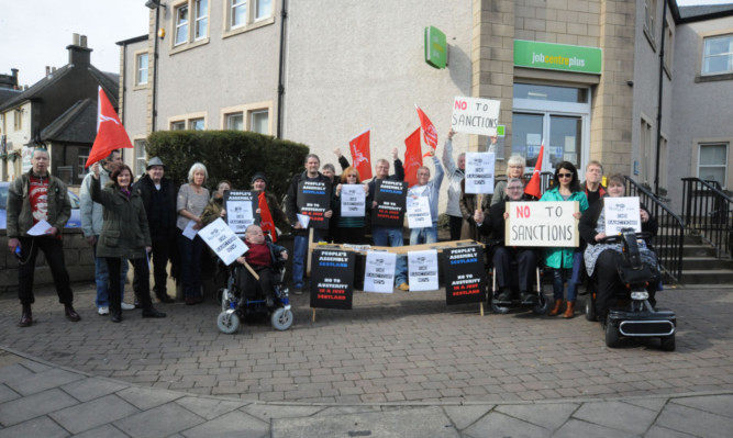 Tam Kirkby, centre, with the campaigners in Kirkcaldy.