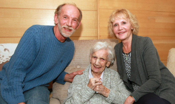 Elizabeth Rudd with her son Richard and his wife Jennifer.