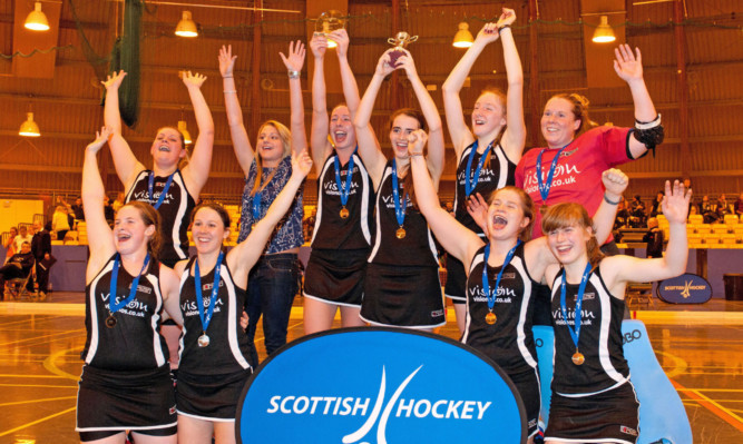 Dundee Wanderers ladies celebrate after winning the National Indoor League Gala Finals.