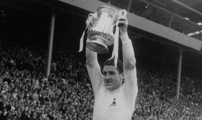 Dave Mackay celebrates winning the FA Cup with Spurs in 1967.