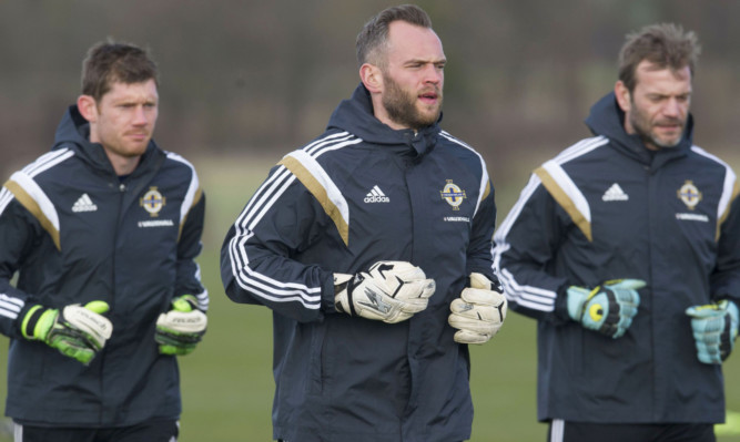 Alan Mannus in training with Michael McGovern and Roy Carroll.