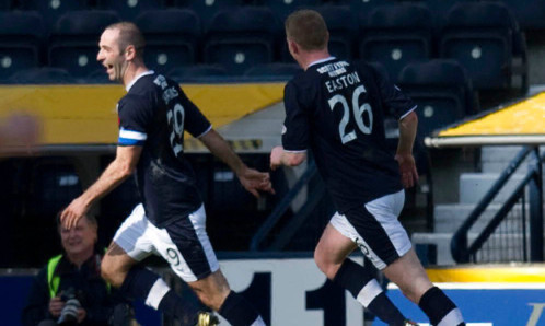 Gary Harkins (left) wheels away to celebrate putting Dundee in front again with his second goal of the game against Kilmarnock.