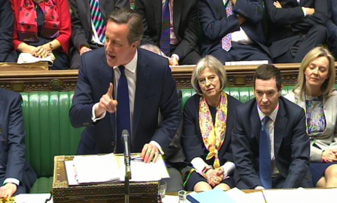 David Cameron speaks during Prime Minister's Questions.
