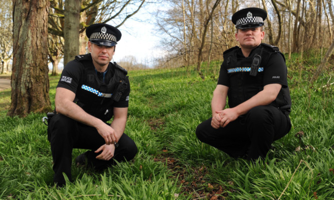 PCs Mark McCulloch and Gavin Kaye on the trail of illegal bikers in Kirkcaldys Beveridge Park.