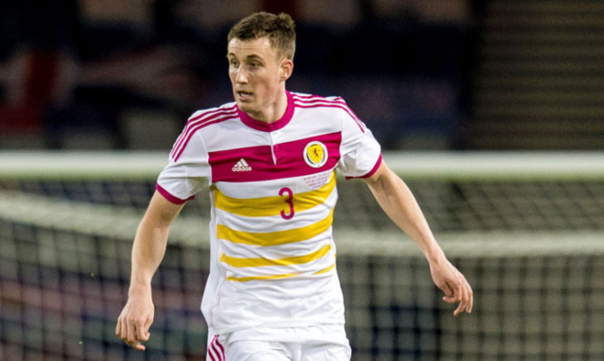 Craig Forsyth in action for Scotland.