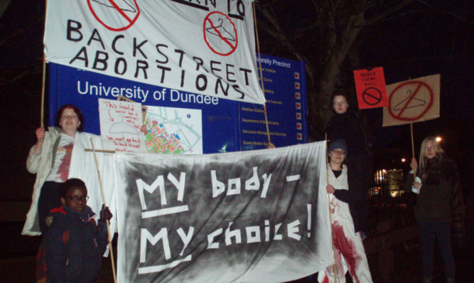Protesters gather outside the Dalhousie Building where the pro-life obstetrician was giving a lecture.