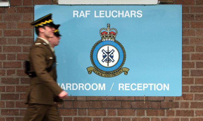 Soldiers arriving for the handover ceremony at RAF Leuchars.