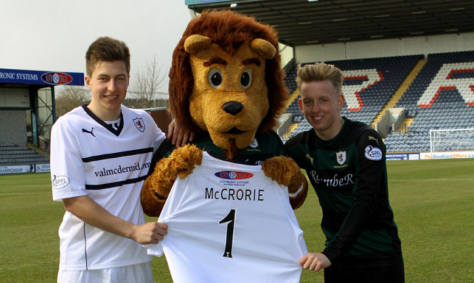 Raith Rovers players Johnny Courts, left, and Callum Robertson with Roary Rover.