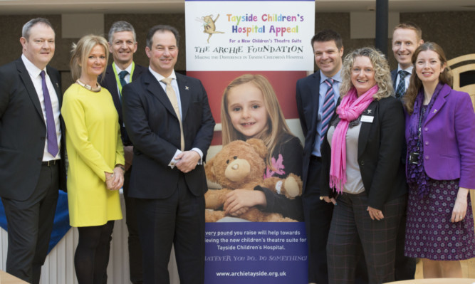 From left: Courier Editor Richard Neville,  Chief Executive NHS Tayside Lesley McLay, Consultant Anaesthetist Grant Rodney, President of Dundee and Angus Chamber of Commerce Tim Allan, RBS Director of Commercial Banking, Tayside and Fife Alastair McLean, Chief executive of Dundee and Angus Chamber of Commerece Alison Henderson, Chief Executive of the ARCHIE Foundation David Cunningham, and Consultant Paediatric Surgeon Lisa Steven.