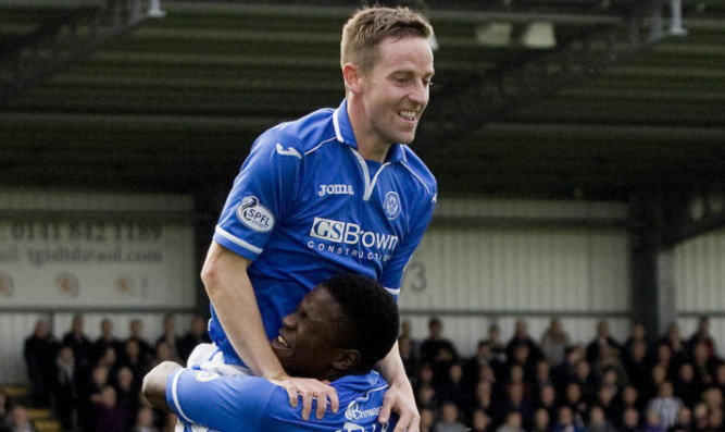 Steven MacLean celebrates a goal with old team-mate Nigel Hasselbaink.