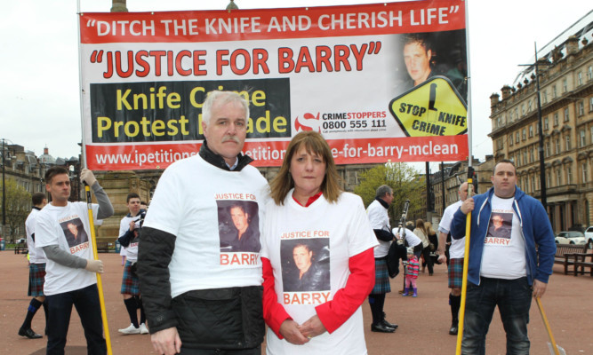 Families of stabbing victims march in Glasgow to demand tougher sentences for knife crime. A Justice for Barry protest was organised by the victims father Alan and mother Tina McLean.